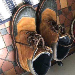 Clark leather and rubber rain boots.